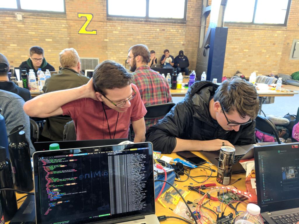 Team smtex hard at work during MHacks 11. They won *Best use of the Twilio API*!